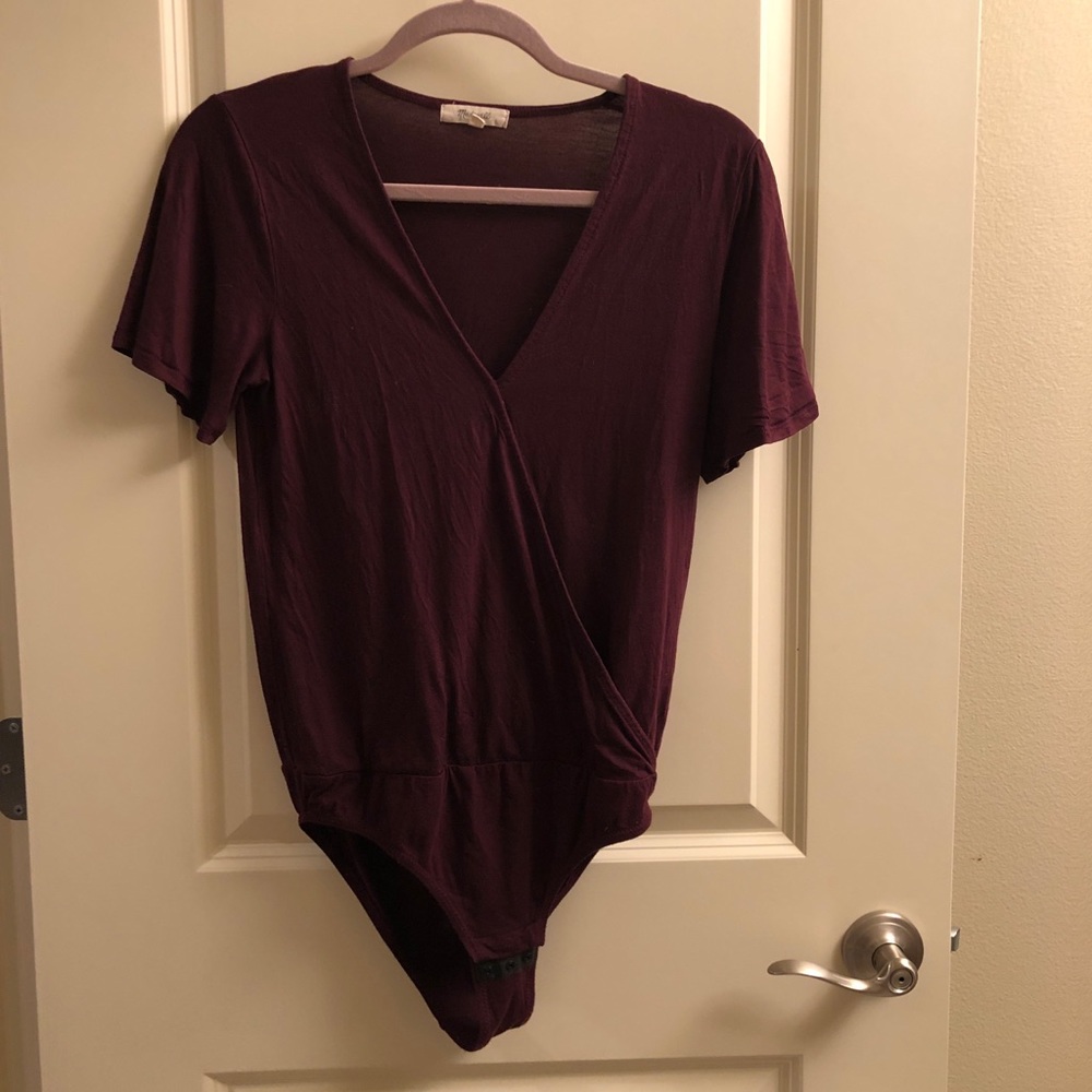 purple body suit